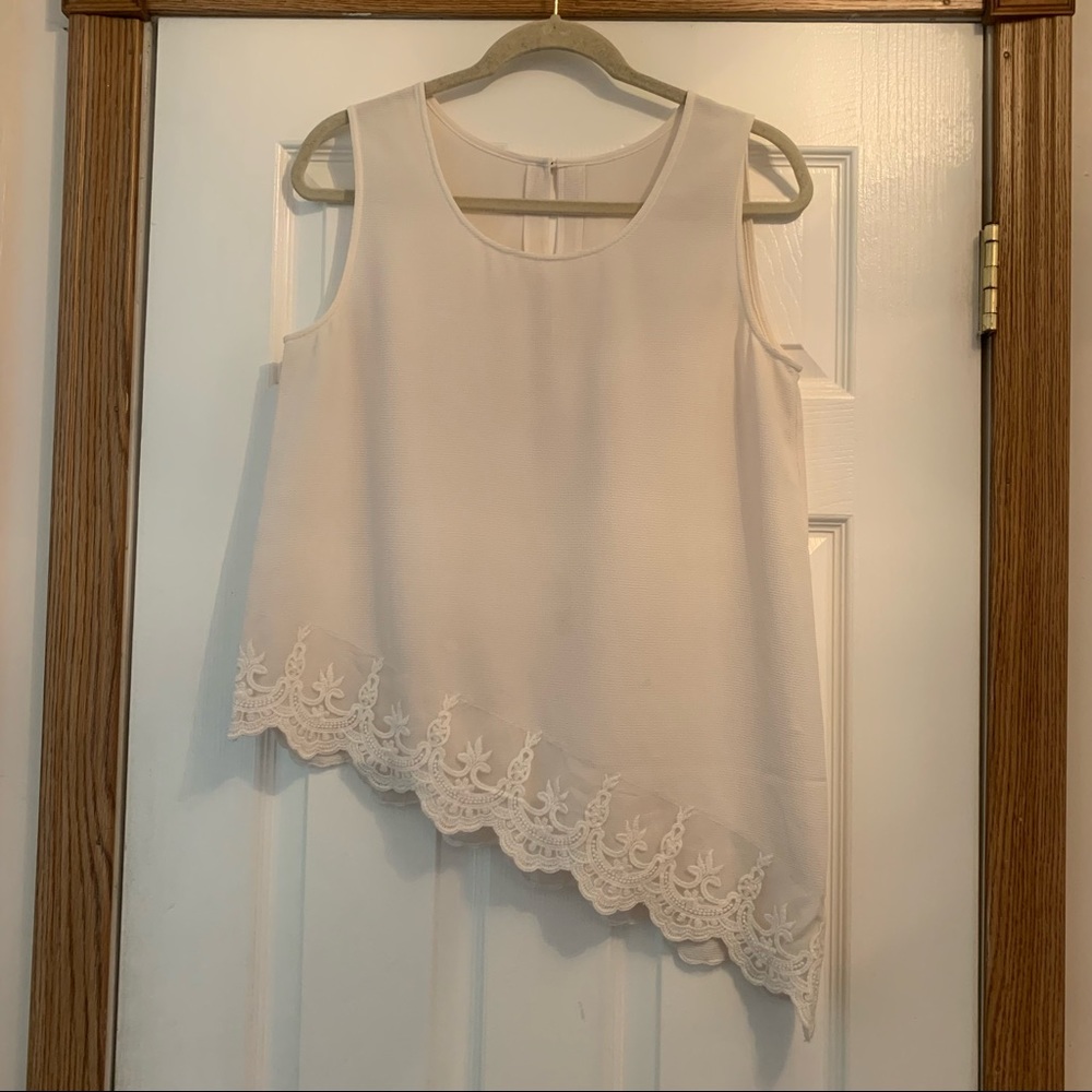 Ivory asymmetrical tank top blouse with lace trim